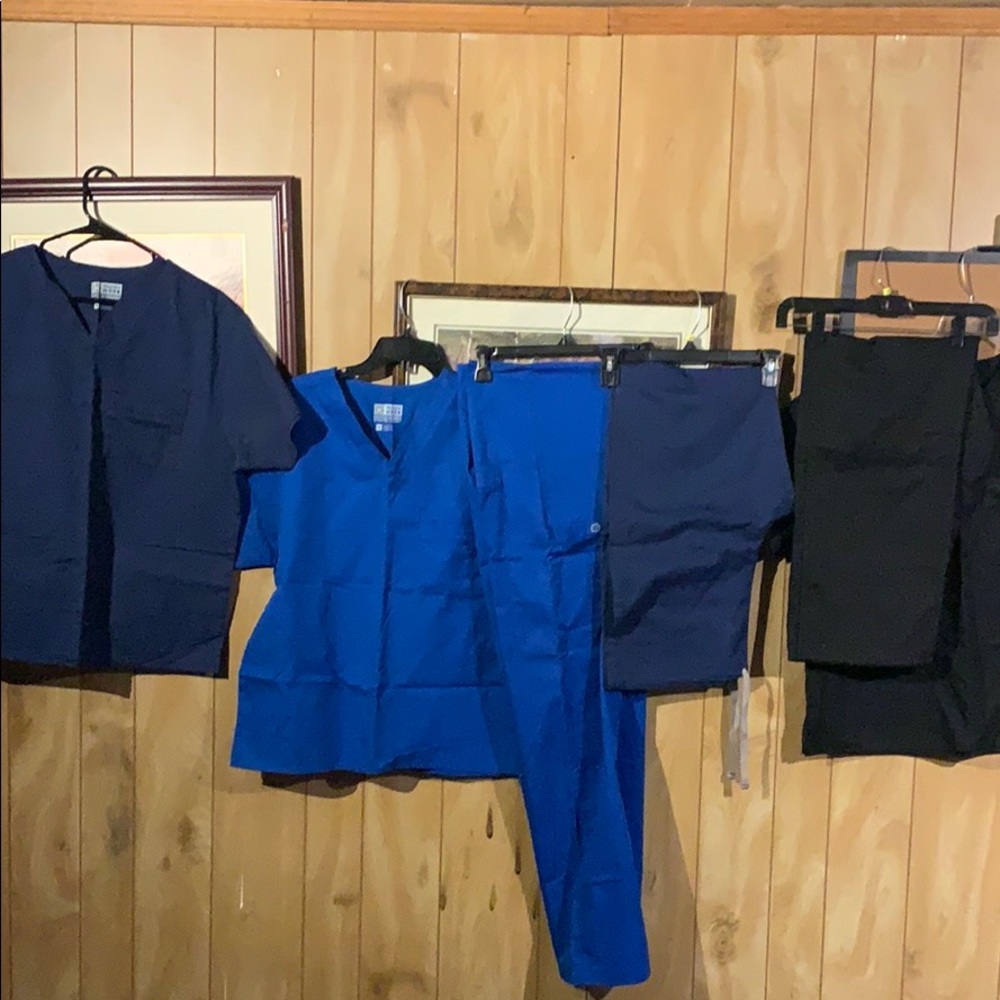 3 sets of scrubs.